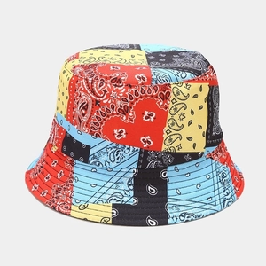 Close-up of multicolor paisley patchwork bucket hat with detailed fabric texture