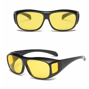 Night vision driving glasses with yellow lenses and black wraparound frame in two views