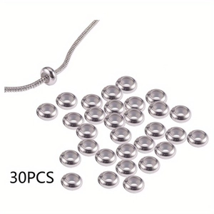 Detailed view of 30 silver spacer beads with silicone inserts on snake chain bracelet