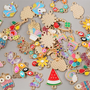 Exquisite assortment of colorful owl and unicorn enamel pendants for jewelry making
