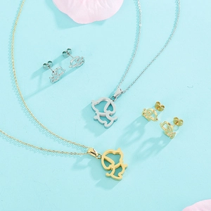 Parure bijoux en acier inoxydable ajouré avec collier et boucles d'oreilles chien
