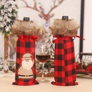 Christmas red and black buffalo plaid wine bottle covers with faux fur collar and Santa decal