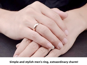 Detail of 4mm rose gold stainless steel band ring shown on a male hand