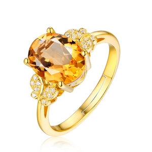 Elegant 18k gold plated ring with large yellow gemstone and small floral side stones