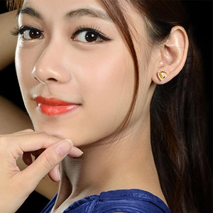 Elegant 18k gold plated heart stud earrings with yellow gemstone and white crystals