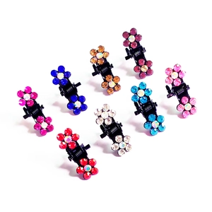 Lot de 8 mini pinces à cheveux avec fleurs en strass colorés sur plastique noir