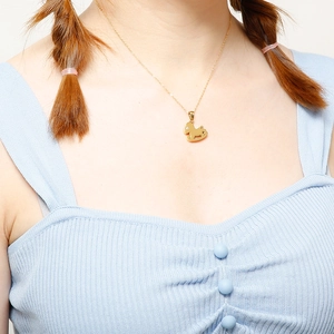 Set collana e orecchini a cavallo a dondolo in oro con piccolo accento di zircone lucido