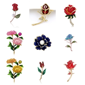 Elegant floral brooches set with rose and tulip designs in colorful rhinestones and gold