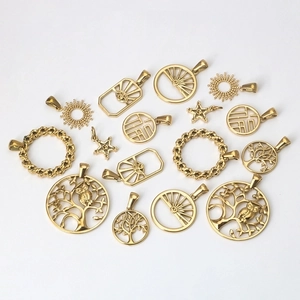 Golden stainless steel charms set with tree of life and star motifs for jewelry making