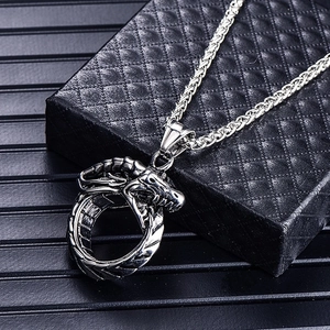 Silver Ouroboros pendant necklace in titanium steel with intricate dragon head carving