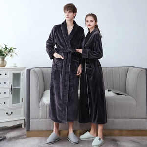 Thick dark gray flannel couple robes with white contrast piping and long sleeve design