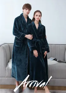Detail view of thickened flannel bathrobes in dark teal with side pockets and waist belt