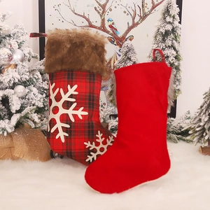 Christmas stocking with red plaid snowflake embroidery and brown faux fur trim for holiday decor