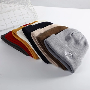 Winter knitted beanie hats with smile embroidery in multiple colors for men and women