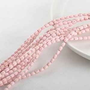 Pink synthetic turquoise oval beads with marble texture for DIY jewelry making and crafts