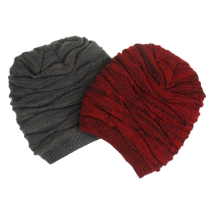 Detailed texture of dark grey and burgundy knitted slouchy beanies for men and women