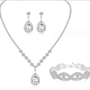 Elegant silver bridal jewelry set with water drop rhinestone necklace earrings and bracelet