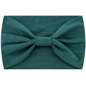 Detail view of a dark teal wide elastic headband with a stylish front knot design