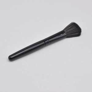 Single professional black blush brush with soft synthetic bristles for face makeup
