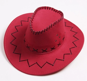 Detail of red cowboy hat with black stitching and metallic vents on suede texture
