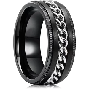 Close-up of black matte spinner ring with rotating silver chain and gear edges