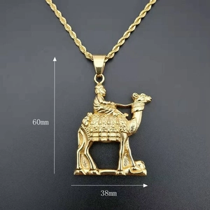 Detailed view of golden camel rider pendant with dimensions 60mm height and 38mm width
