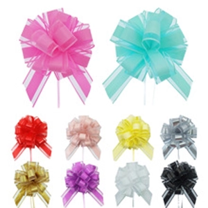 Assorted colorful matte ribbon pull bows for festive Christmas gift wrapping decoration