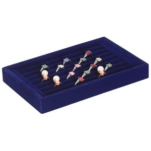 Blue velvet jewelry display tray with parallel slots for rings and stud earrings