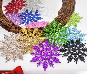 Close-up of sparkling 10cm Christmas glitter snowflakes in assorted colors for tree decor