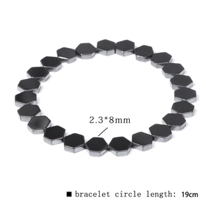 Detail view of 2.3*8mm hexagonal black hematite beads on a 19cm elastic bracelet