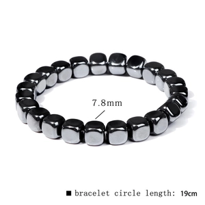 Detail view of 7.8mm square hematite beads on a 19cm elastic bracelet for men
