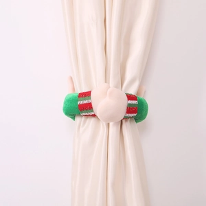 Fermatende a forma di mano di elfo di Natale con strisce festive rosse, verdi e bianche