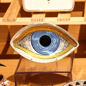 Artistic blue ceramic oval evil eye jewelry tray with gold rim for home decor