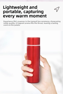Close-up of portable red metallic vacuum flask with a leak-proof white seal ring detail