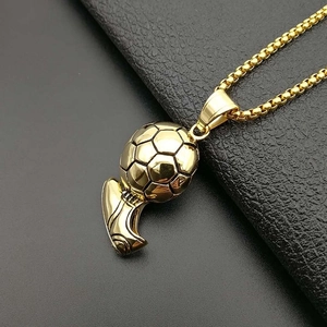Golden titanium steel necklace pendant featuring a detailed soccer ball and football cleat