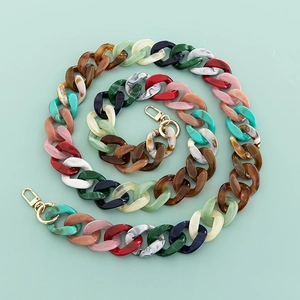Detailed view of colorful 120cm acrylic chain straps with golden metal lobster clasps