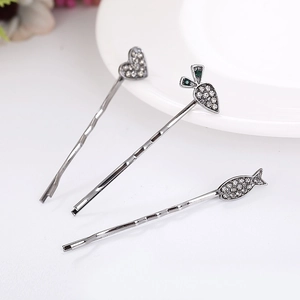 Gold-plated alloy hair clips featuring heart, carrot, and fish shapes with rhinestones