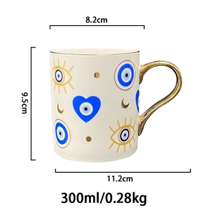 Detailed dimensions of white ceramic mug with blue evil eye and gold handle (300ml capacity)