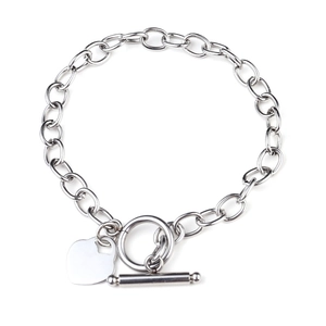 Silver stainless steel heart pendant bracelet with OT toggle clasp on white background