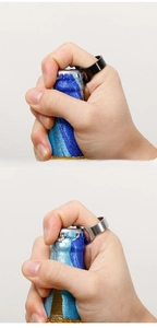 Close-up of black and silver stainless steel rings used as portable bottle openers