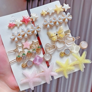 8-piece set of macaron hair clips with pearls and heart starfish designs for women