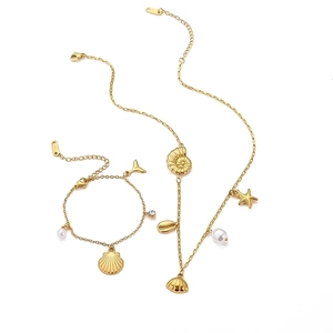 Golden beach style stainless steel jewelry set with shell starfish and pearl charms