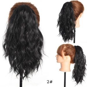 Detail view of wave texture on 30cm black drawstring synthetic ponytail hair extension