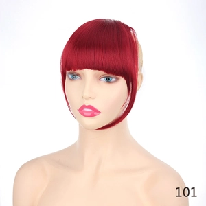Detail view of red synthetic fiber air bangs with sideburns on a mannequin head