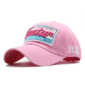 Detail showing the 1932 embroidery and fabric texture of this pink vintage baseball cap