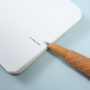 Creative brown ice cream cone gel pen with waffle texture writing on white paper
