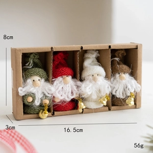 Set of 4 handmade knitted Christmas gnomes with bells in a kraft gift box display