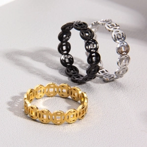Retro hollowed copper coin patterns on titanium steel rings in gold, silver, and black