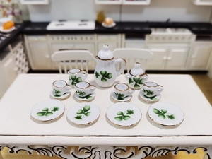 Miniature dollhouse ceramic tea set with green clover pattern and gold trim 15 pieces