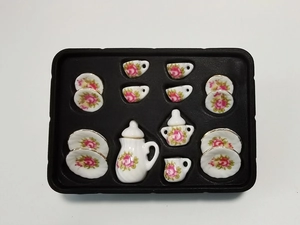 Detail view of 15-piece dollhouse miniature ceramic tea set with pink rose pattern